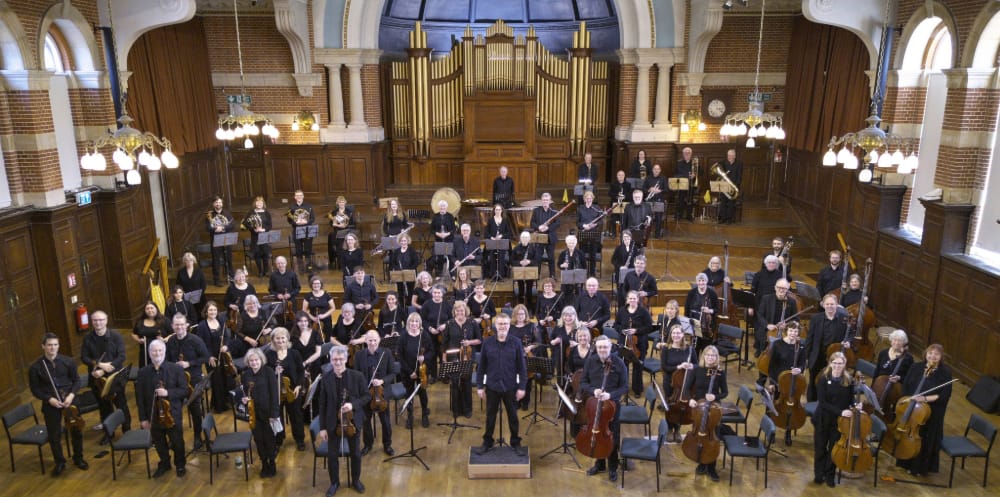 The orchestra performing at Reading University Great Hall